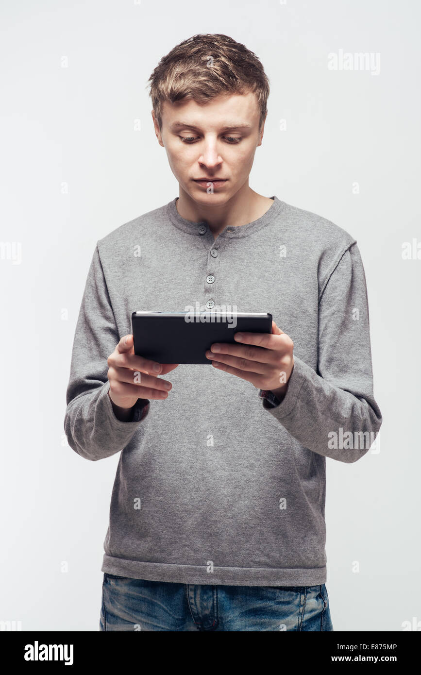 Human Using Tab The man uses a tablet Stock Photo - Alamy
