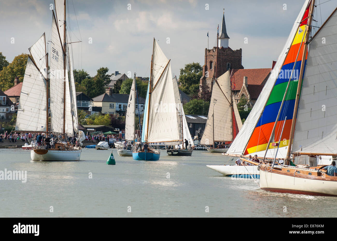 Various sailing craft participate in the spectacular Parade of Sail Blackwater River at the Maldon Regatta in Essex. Stock Photo