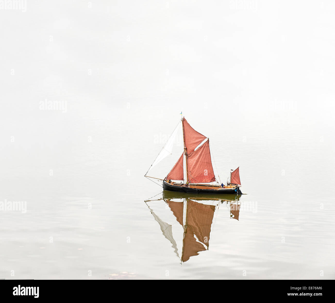 A scale model of the Sailing Barge Vigilant on the Ornamental Lake in the Promenade Park in Maldon, Essex. Stock Photo