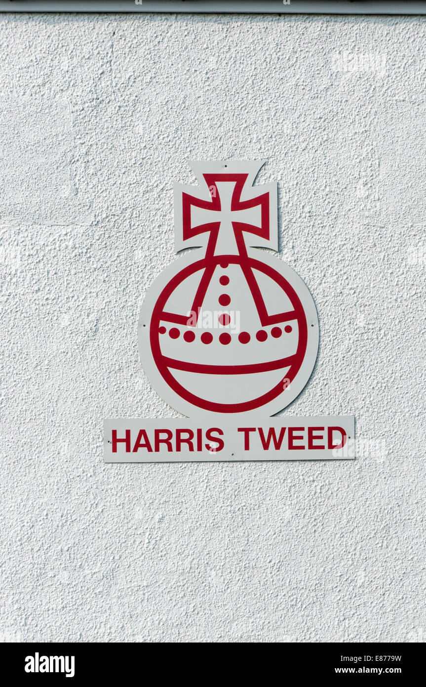 The Harris Tweed orb symbol on the side of the Harris Tweed shop in Tabert. Stock Photo