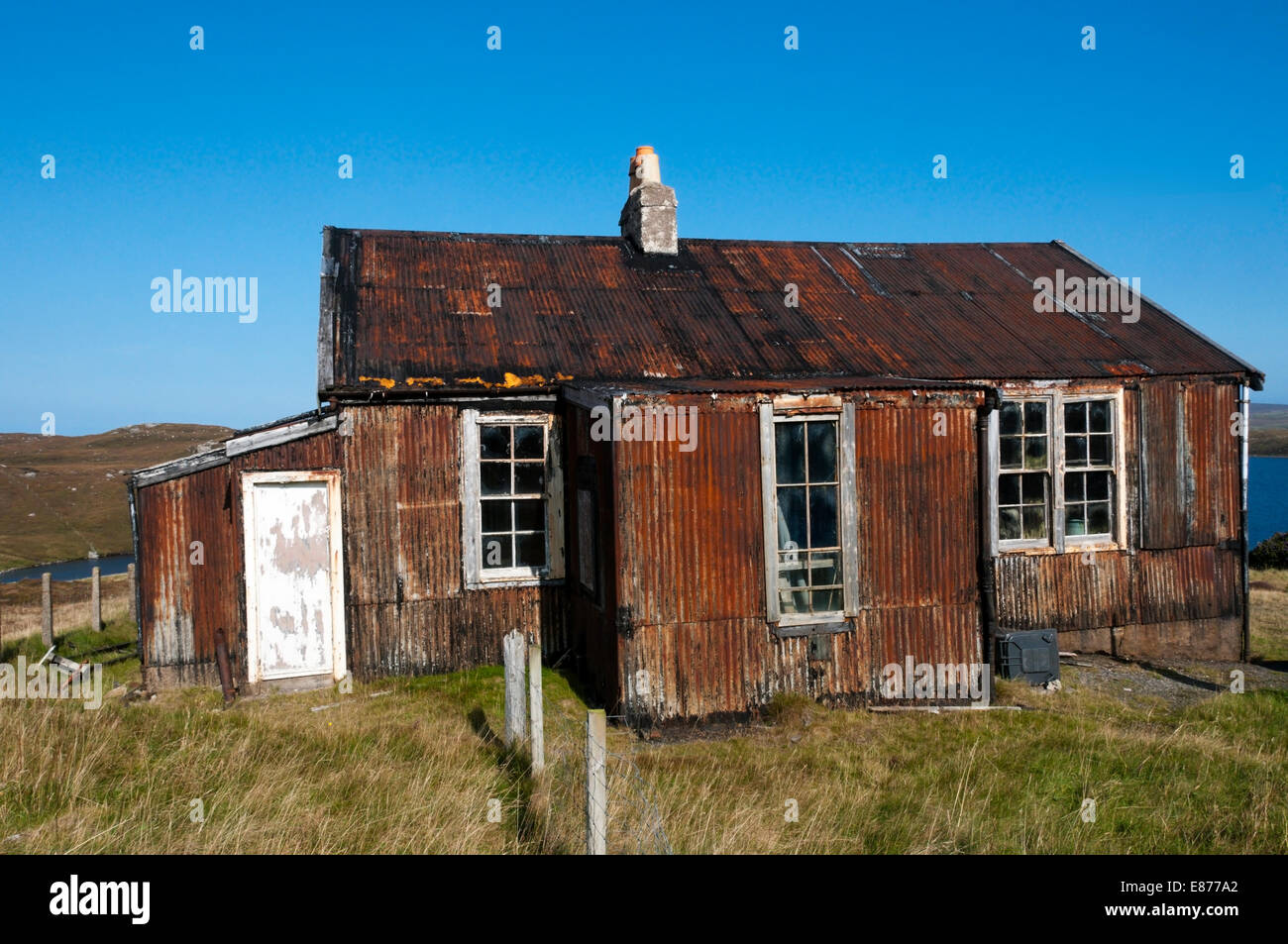 A rusted corrugated iron building on the Isle of Lewis in the Outer Hebrides. Stock Photo