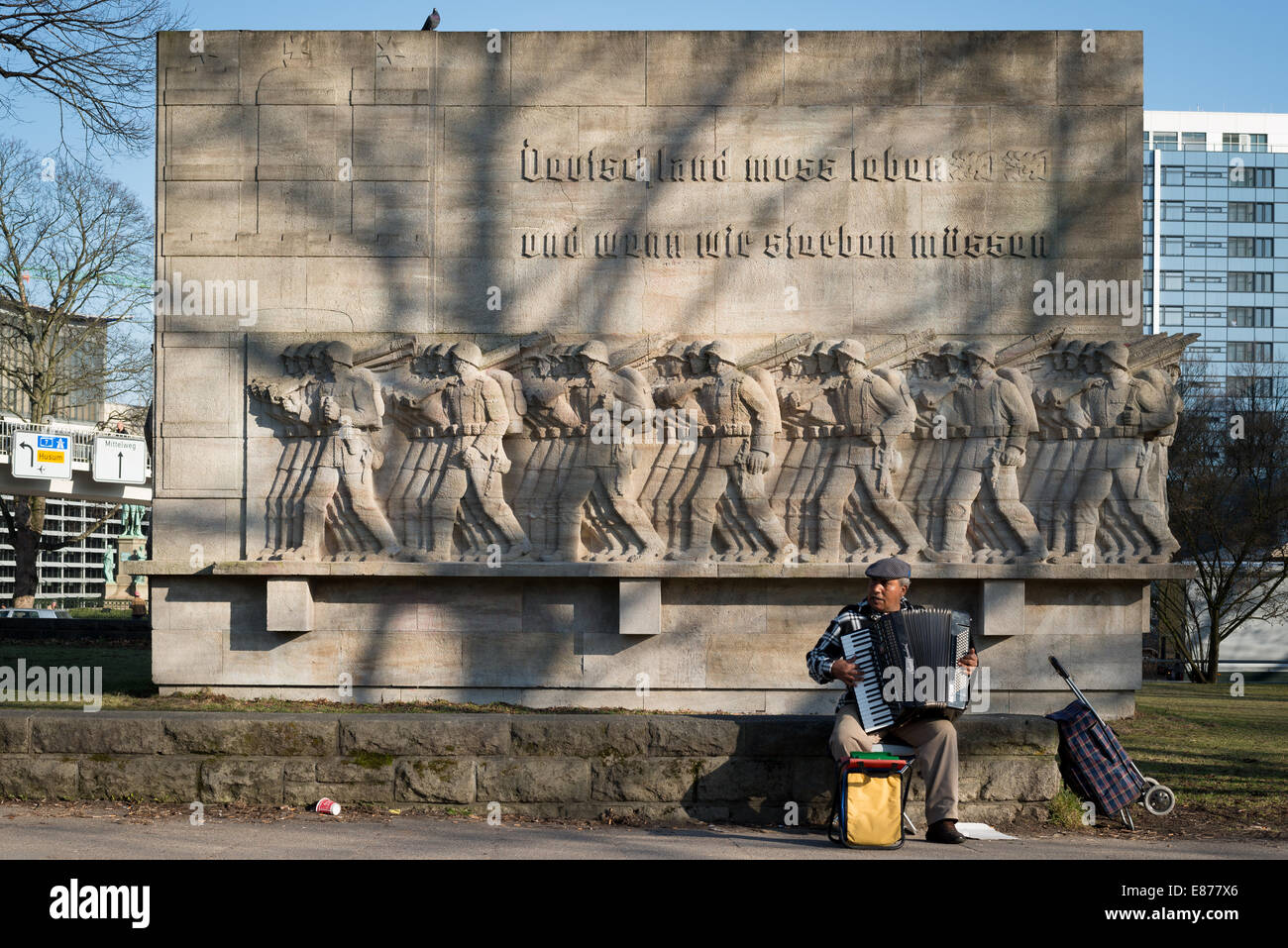 Hamburg, Germany, a street musician with accordion before the 76th war memorial Stock Photo