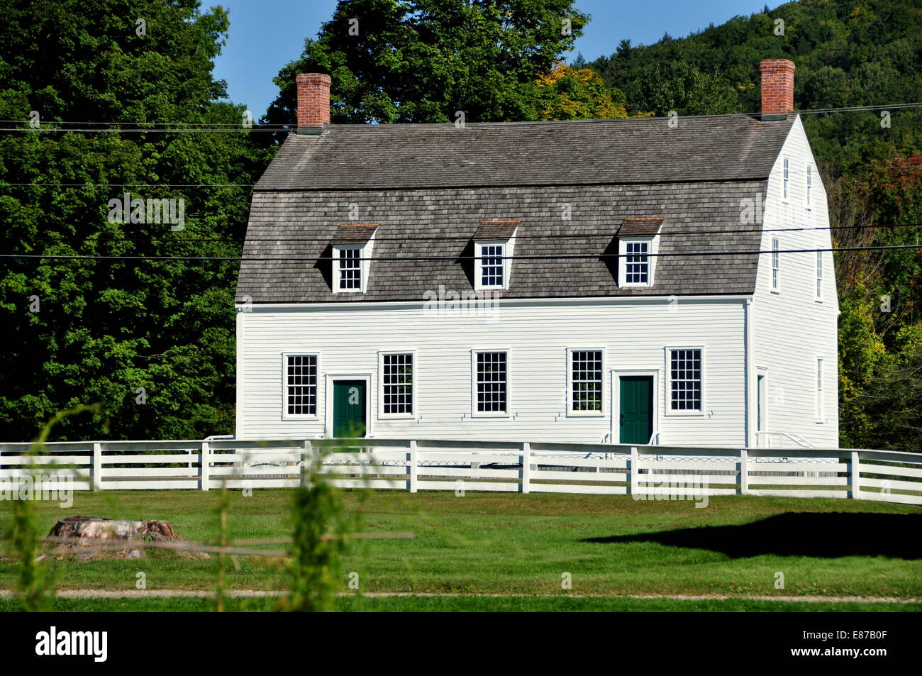 Hancock, Massachusetts:  18th century Meeting House with dormers and gambrel roof at the Hancock Shaker Village Stock Photo