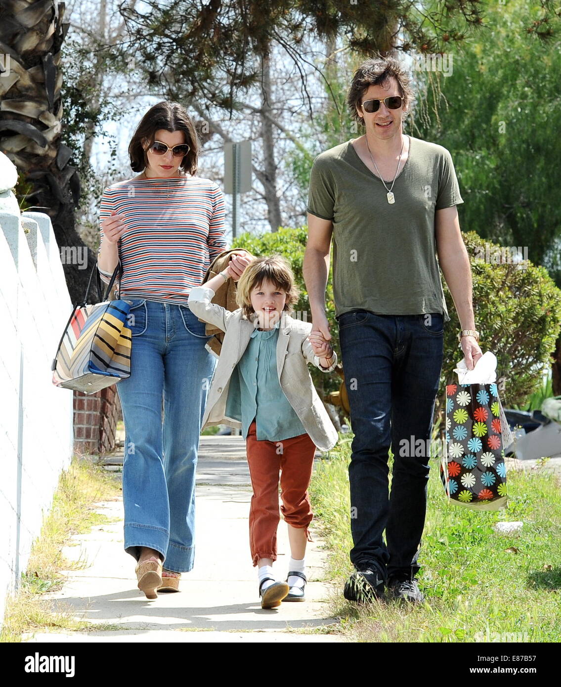 Milla Jovovich and husband Paul W. S. Anderson take their daughter Ever ...