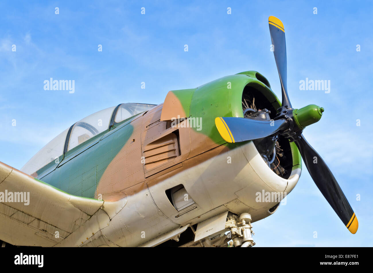 Old fighter aircraft used in world war 2 of Thailand on blue sky background Stock Photo