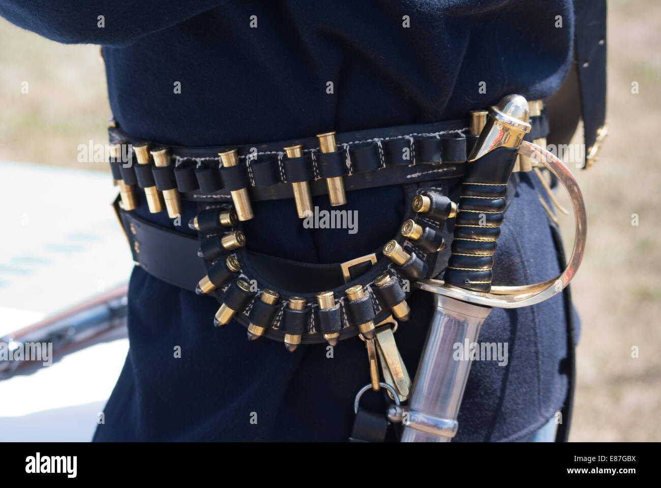 Vintage gun belt and military sword typical of equipment used by the U.S. Cavalry during the Indian Wars. Stock Photo