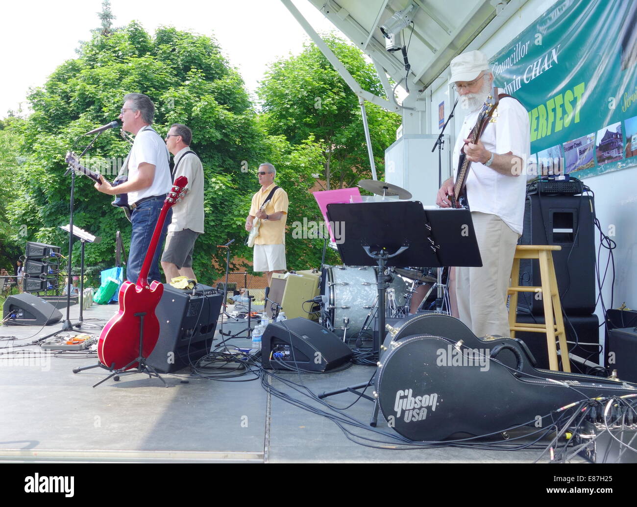 Tribute band playing on stage at an outdoor event outside Toronto, Canada  Stock Photo - Alamy