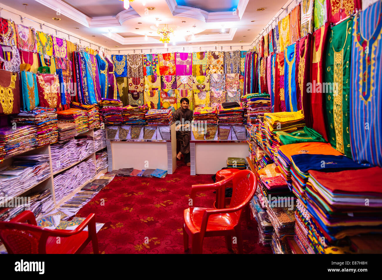 Cloth shop seller in Ras Al Khaimah, UAE Stock Photo Alamy