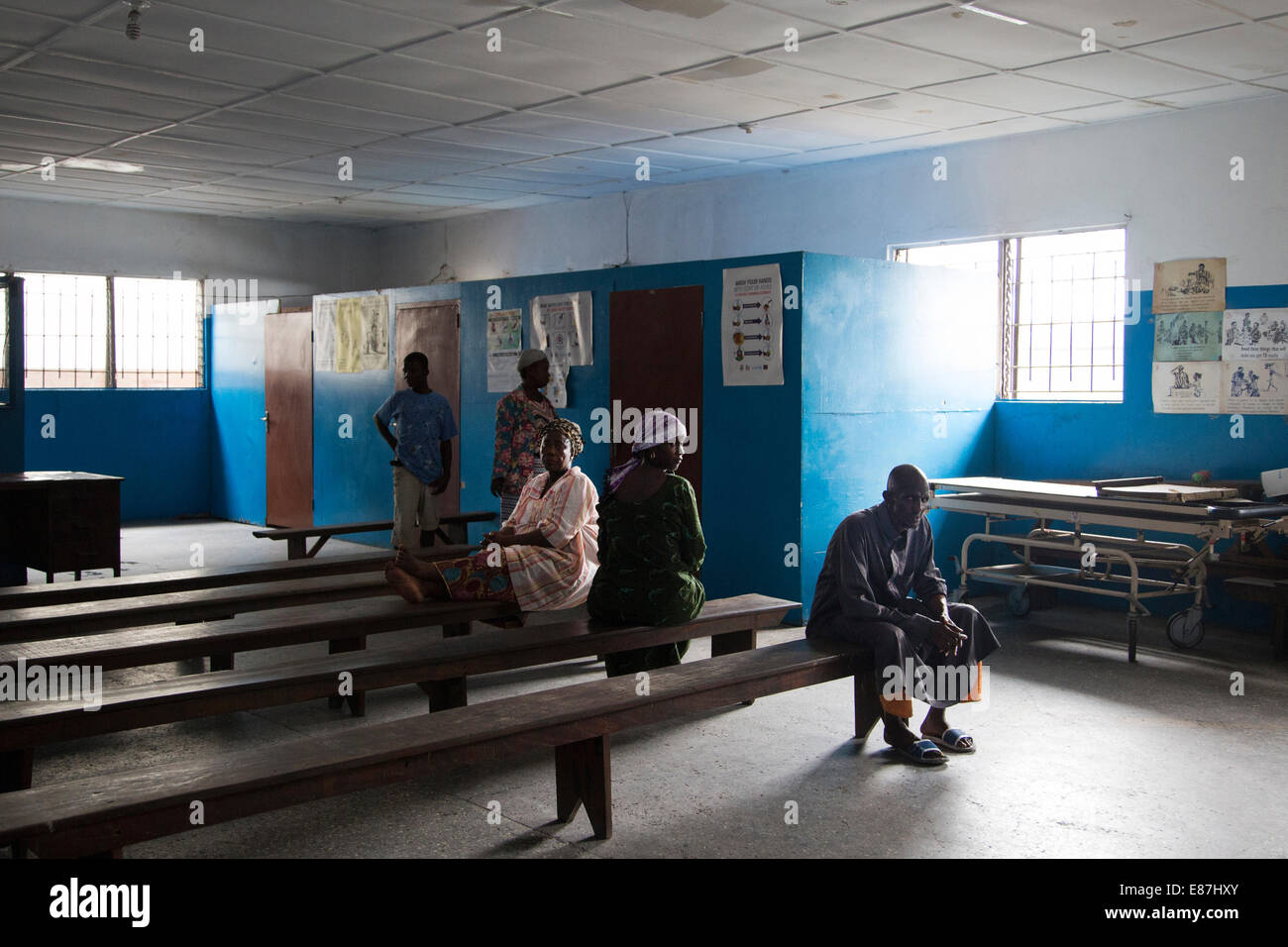 People wait to be seen at a health clinic in West Point - a district of Monrovia Liberia quarantined because of the Ebola outbre Stock Photo