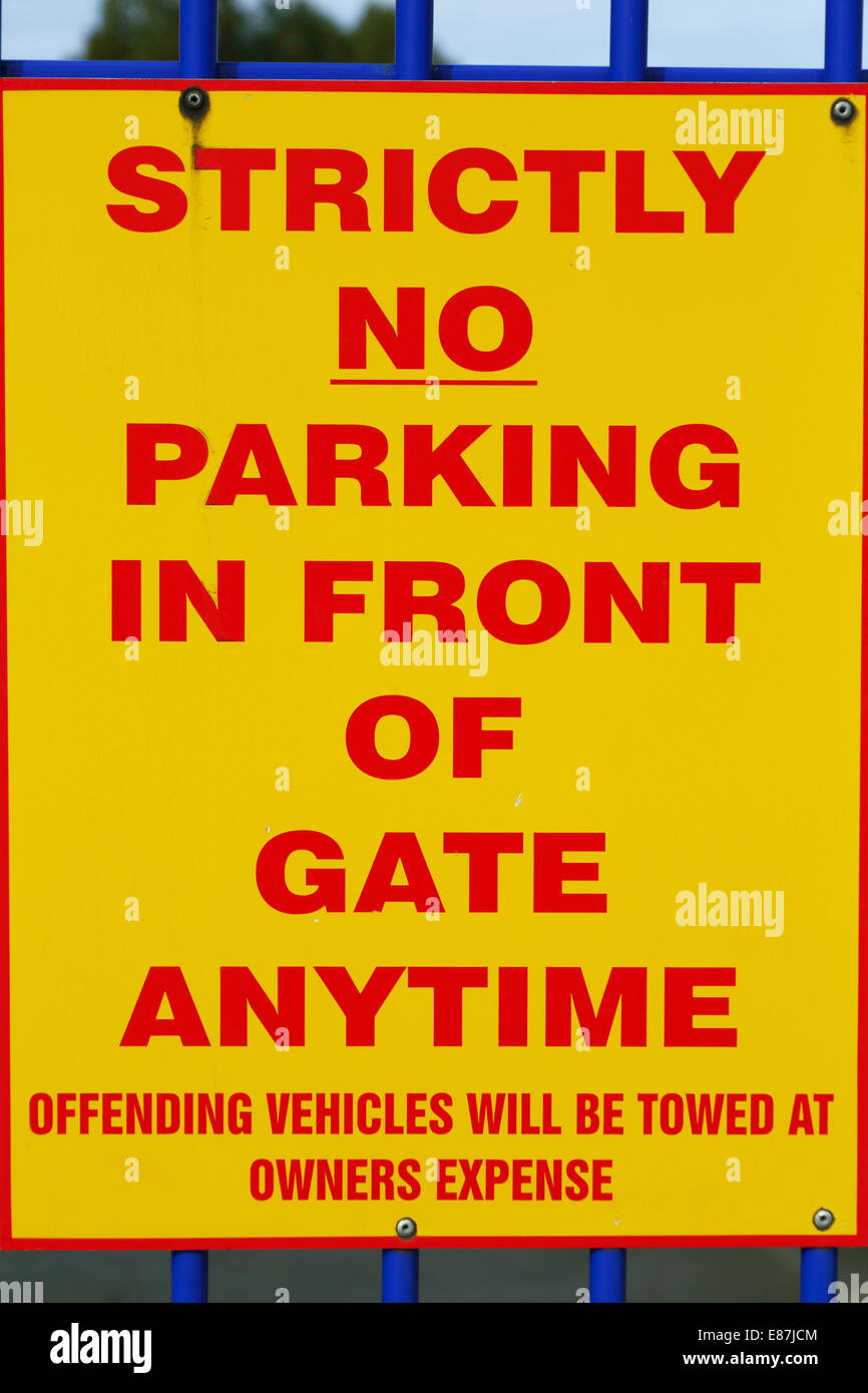A sign on a gate warns strictly no parking in front of gate anytime