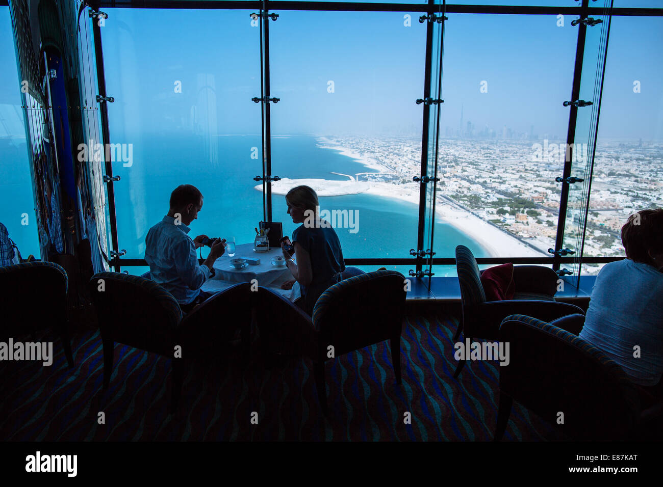 Couple about to have lunch in Burj Al Arab Hotel Skyview Bar Stock Photo