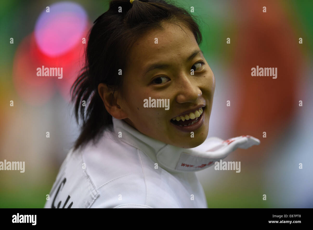 (141002) -- INCHEON, Oct. 2, 2014 (Xinhua) -- Wang Wei of China reacts during the women's individual fencing match of modern pentathlon at the 17th Asian Games in Incheon, South Korea, Oct. 2, 2014. (Xinhua/Xie Haining)(mcg) Stock Photo