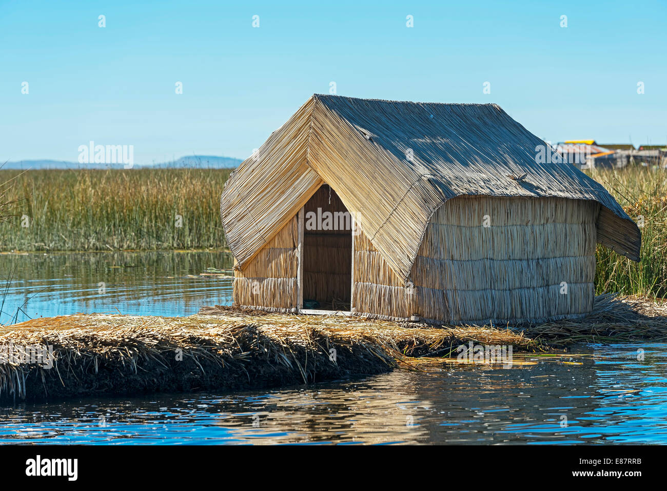 Reed hut, floating islands of the Uros on Lake Titicaca, Puno, Peru