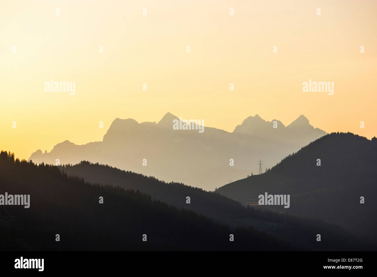 Lofer Mountains or Loferer Mountains, silhouetted in the morning light, morning atmosphere, Alps, Tyrol, Austria Stock Photo
