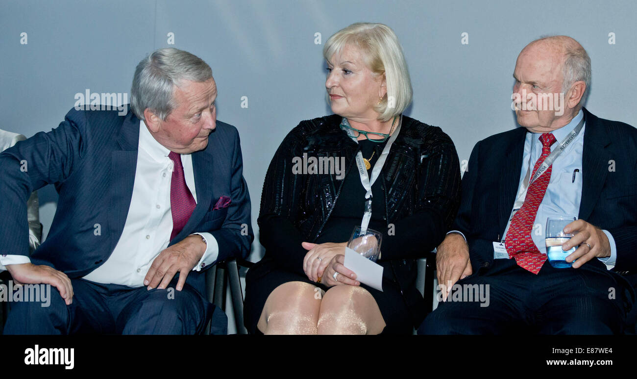 Paris, France. 1st Oct, 2014. Porsche chairman Wolfgang Porsche (L) talks the chairman of Volkswagen Ferdinand Piech and his wife Ursula, during the Volkswagen Group Night prior to the Paris Motor Show (Mondial de l'Automobile) in Paris, France, 1 October 2014, the new VW XL Sport. The Paris Motor Show, which takes place every other year, runs from 4 until 19 October. Photo: Daniel Karmann/dpa/Alamy Live News Stock Photo