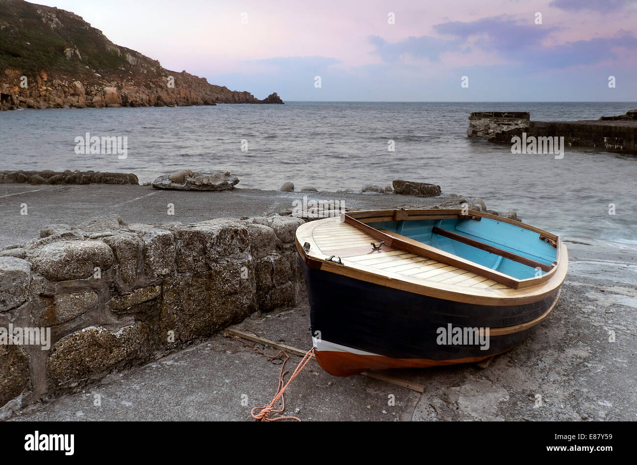 A dinghy on the slip at Lamorna Cove in Cornwall. Stock Photo