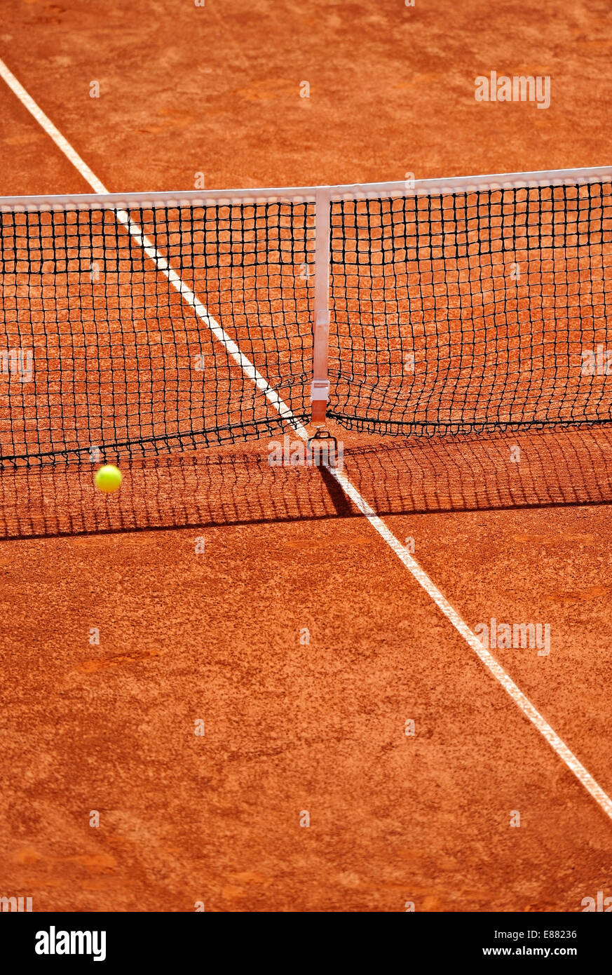 Tennis net detail on a clay court during a match Stock Photo