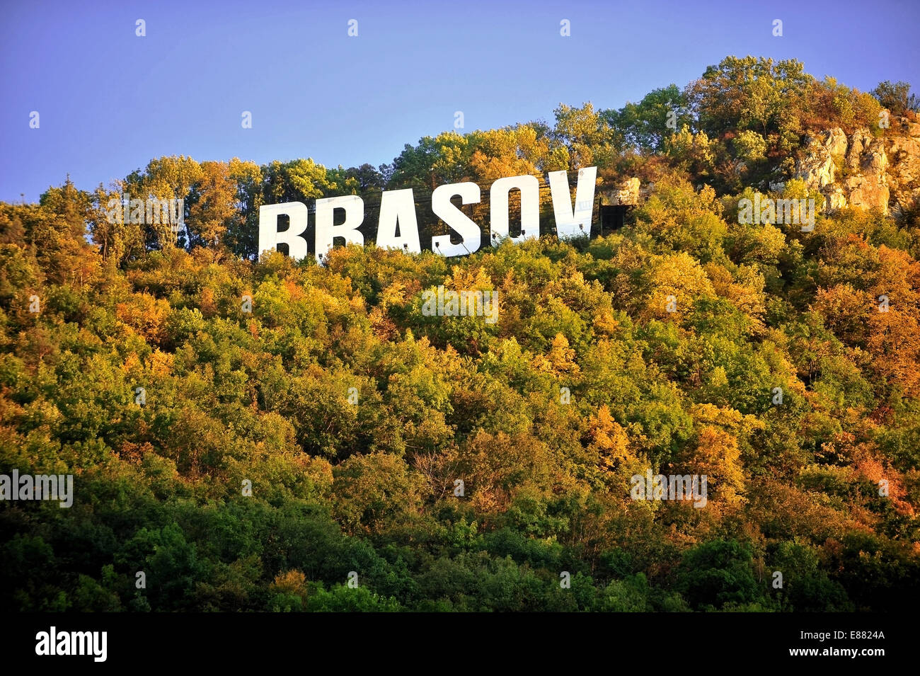 Autumn image with Brasov city sign on top of Tampa mountain Stock Photo