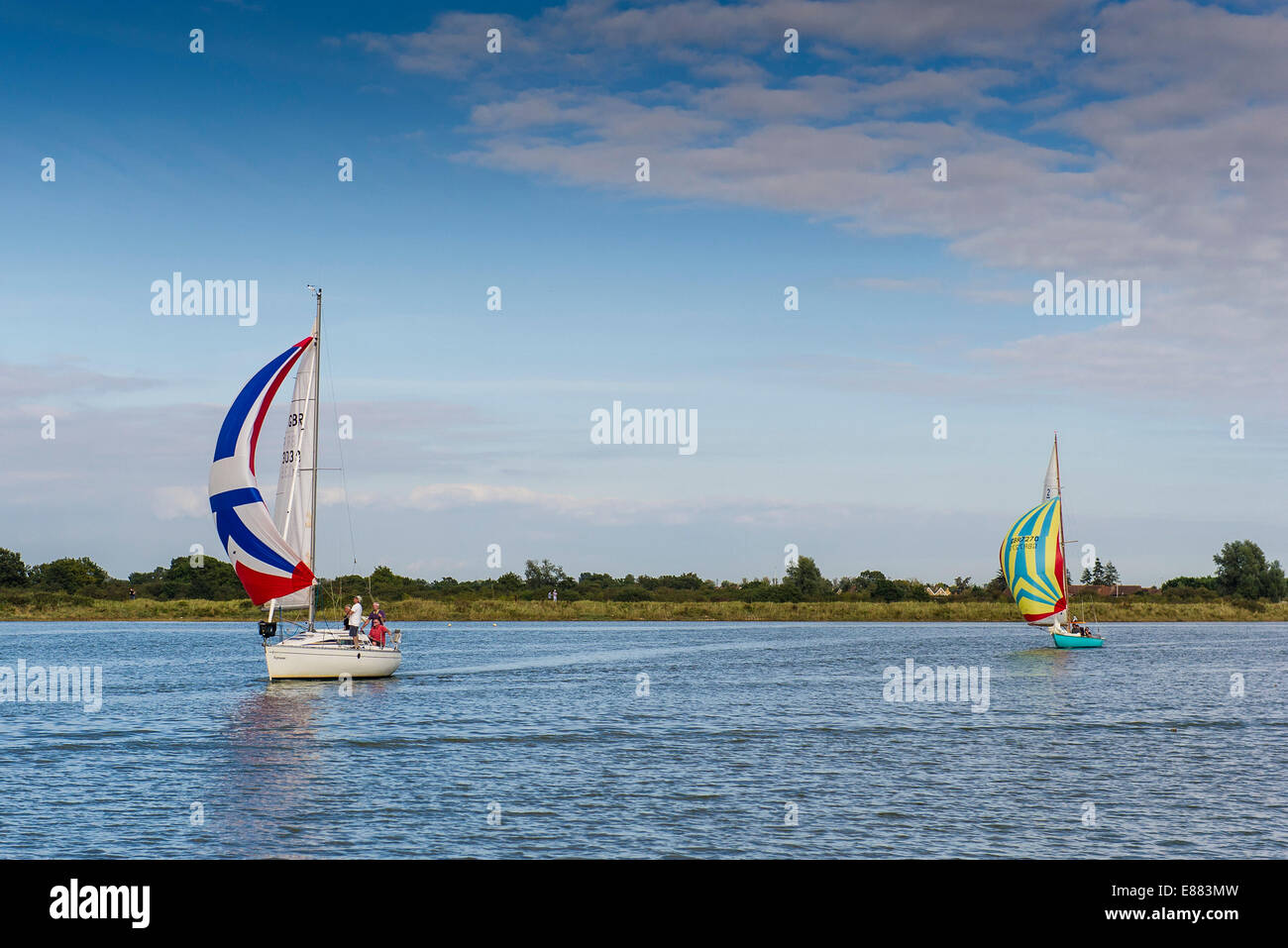 Various sailboats participating in the spectacular Parade of Sail at the Maldon Regatta in Essex Stock Photo