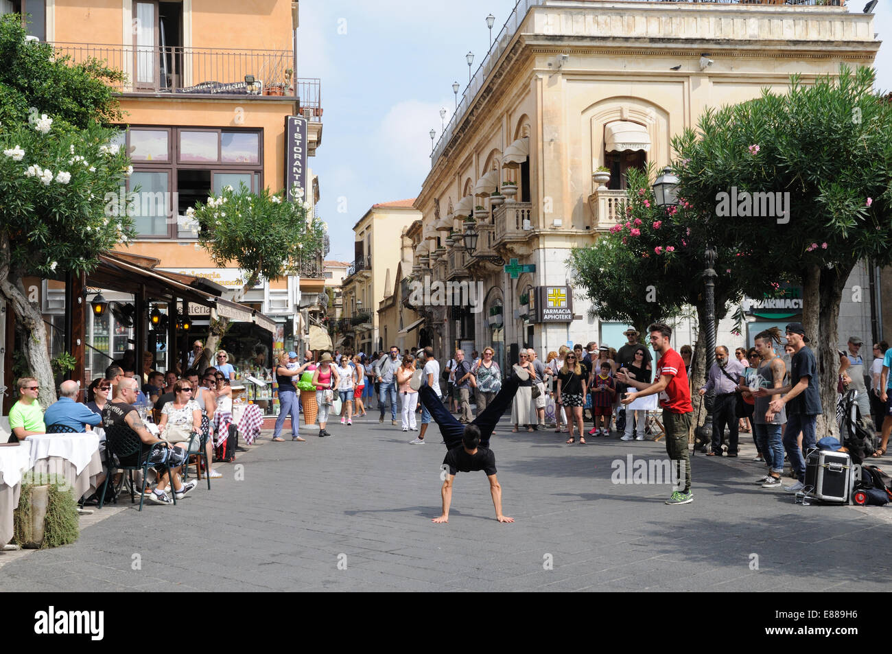 Rap dancers entertaining tourists in a square  Taormina Sicily Italy Stock Photo