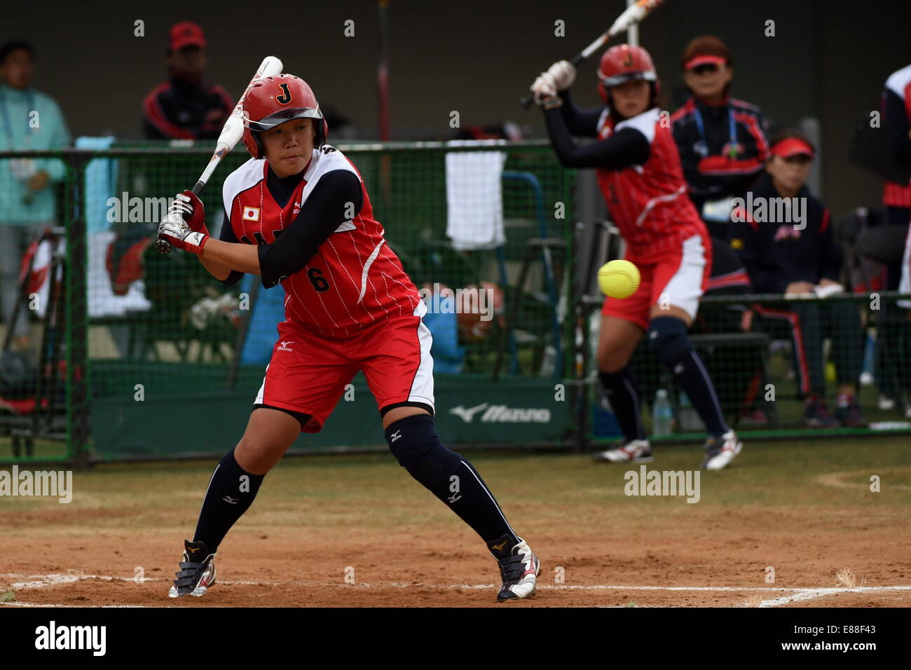 (141002) -- INCHEON, Oct. 2, 2014 (Xinhua) -- Sakamoto Haruna of Japan hits the ball during the women's softball grand final match against Chinese Taipei at the 17th Asian Games in Incheon, South Korea, Oct. 2, 2014. Japan won 6-0 and claimed the title. (Xinhua/Gao Jianjun)(mcg) Stock Photo