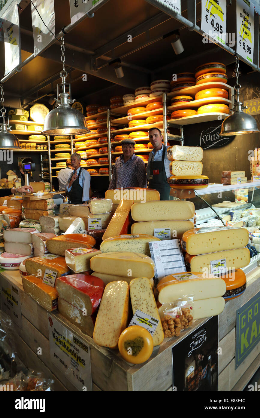 Rotterdam, Netherlands. 30th Sept, 2014. A cheese stall in the Markthal Rotterdam in Rotterdam, the Netherlands. The covered market was designed by architects MVRDV and the interior bears the biggest artwork in the Netherlands, 'The Horn of Plenty' by Arno Coenen and Iris Roskam. The market was officially opened by Queen Maxima on 1 October 2014. Credit:  Stuart Forster/Alamy Live News Stock Photo