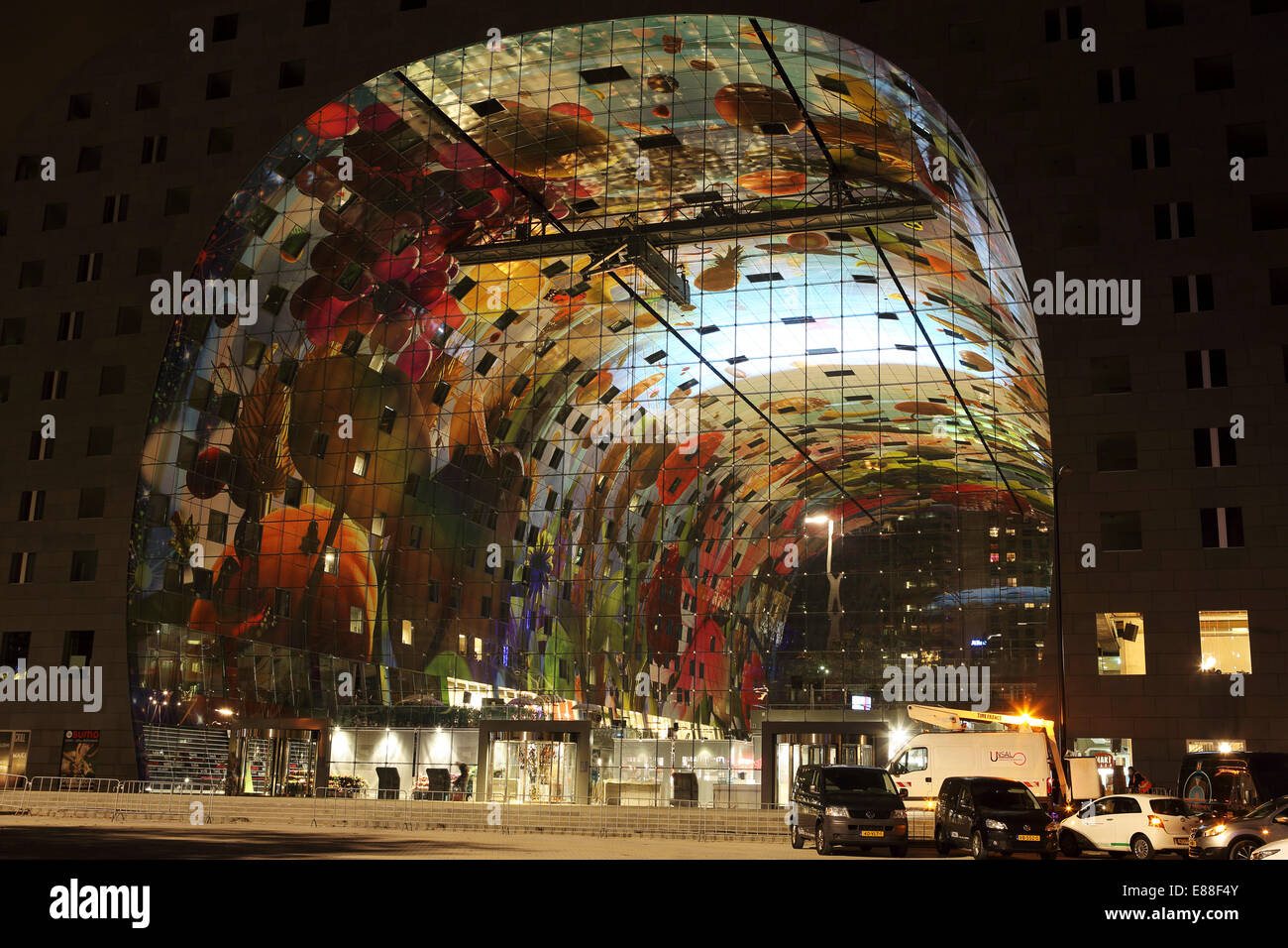 Rotterdam, Netherlands. 30th Sept, 2014. The Markthal Rotterdam at night in Rotterdam, the Netherlands. The covered market was designed by architects MVRDV and the interior bears the biggest artwork in the Netherlands, 'The Horn of Plenty' by Arno Coenen and Iris Roskam. The market was officially opened by Queen Maxima on 1 October 2014. Credit:  Stuart Forster/Alamy Live News Stock Photo