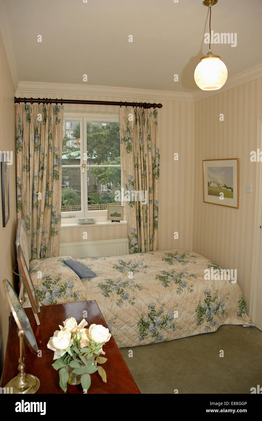 Globe Ceiling Light In Small Bedroom With Blue Floral