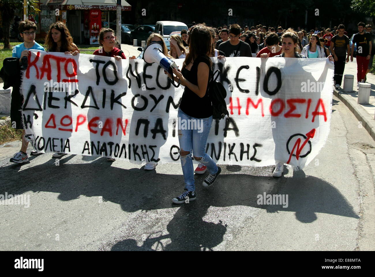Thessaloniki, Greece, 2nd October,  2014. Around a hundred secondary school students hit the streets of Thessaloniki, Greece's second largest city, protesting a new law that came into effect last year, which the students say, caused a sharp increase in the fail rate. Credit:  Orhan Tsolak / Alamy Live News Stock Photo