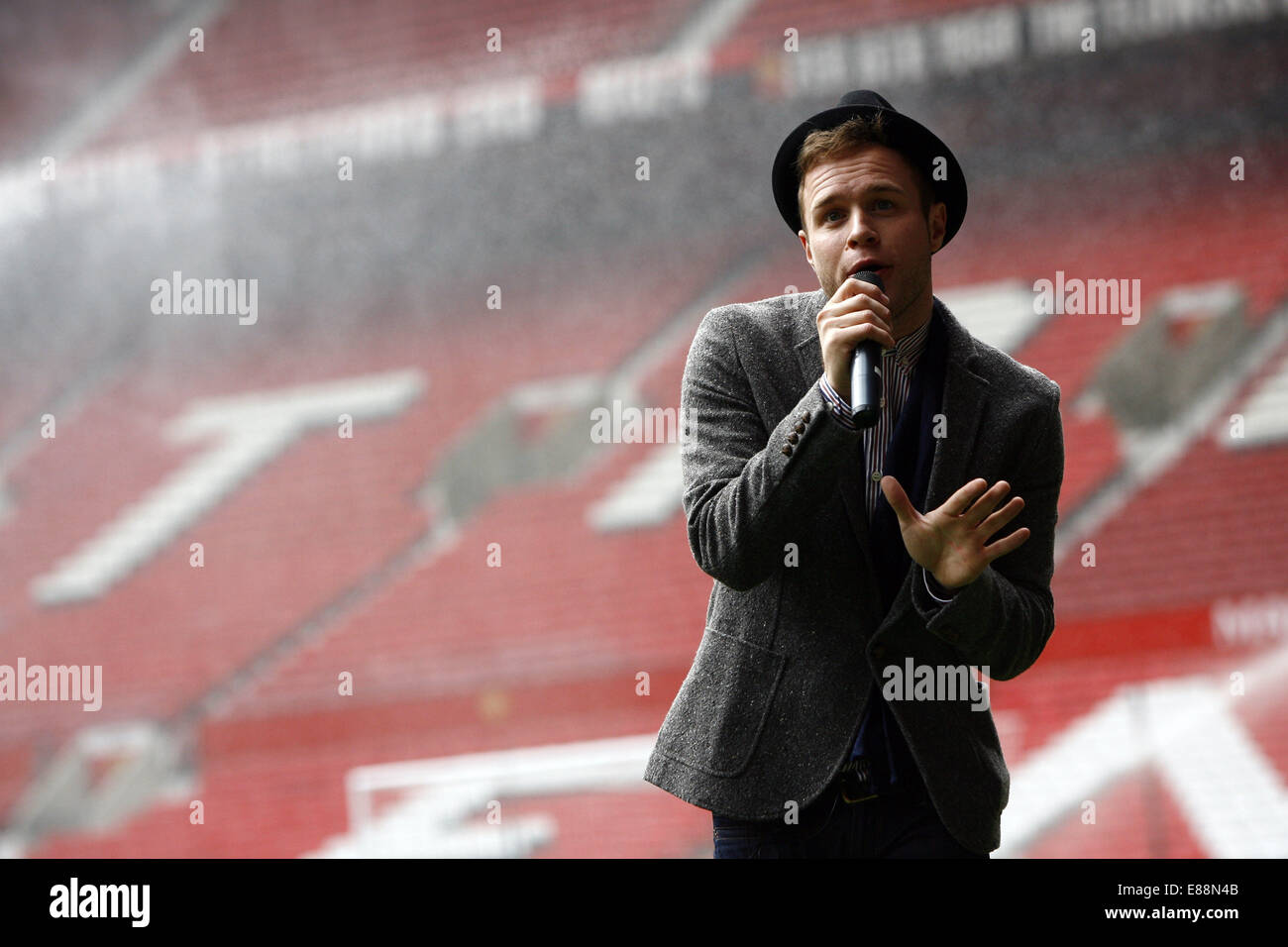 picture by Chris Bull Manchester United Foundation open training at Old Trafford .  Singer Olly Murs  . Stock Photo