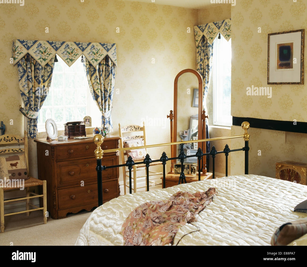 Blue White Curtains And Pointed Pelmet On Window In Bedroom With