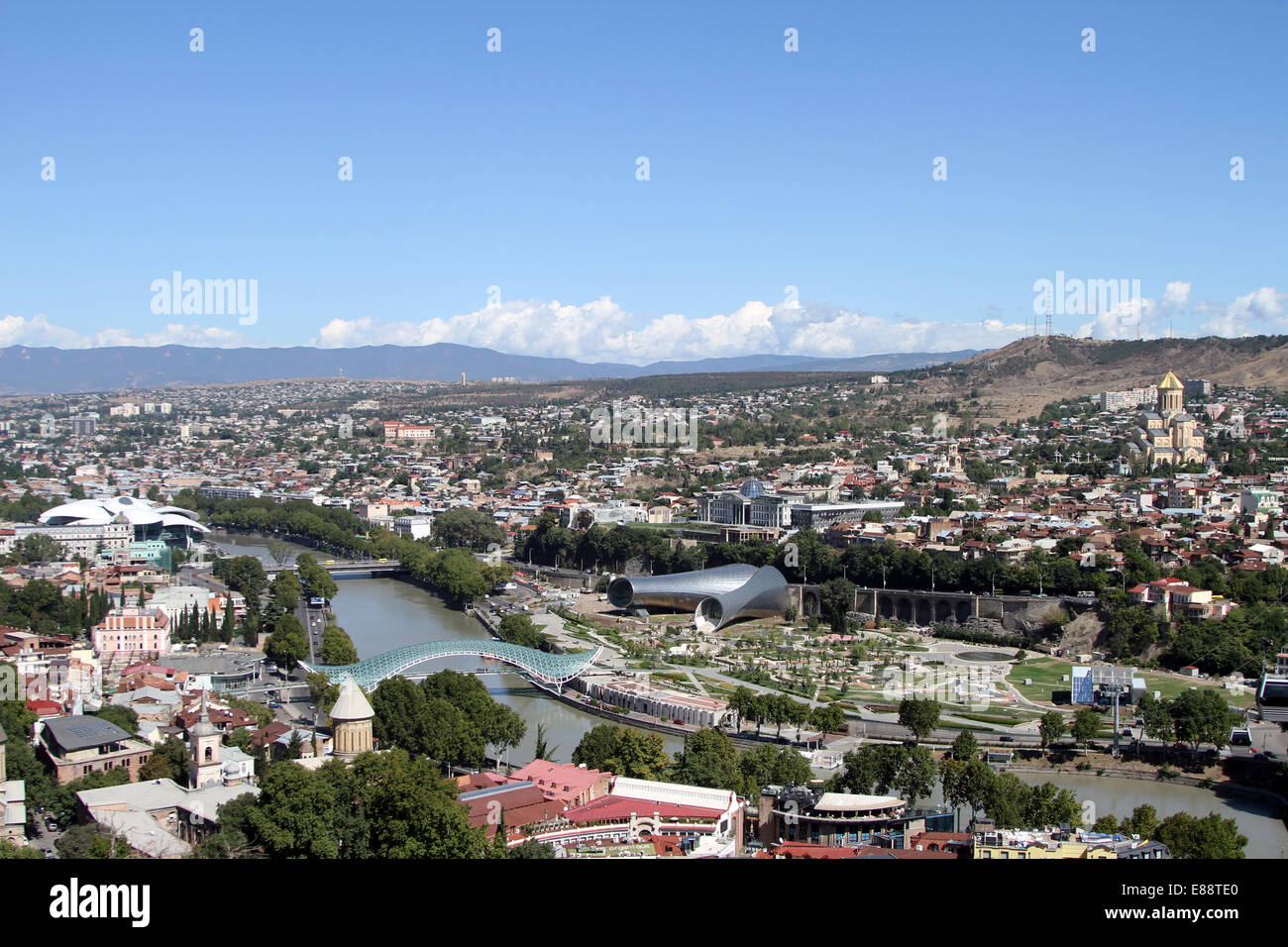 View over the centre of Tbilisi, Georgia, taking in the Mtkvari River, the Bridge of Peace and Rike Park. Stock Photo