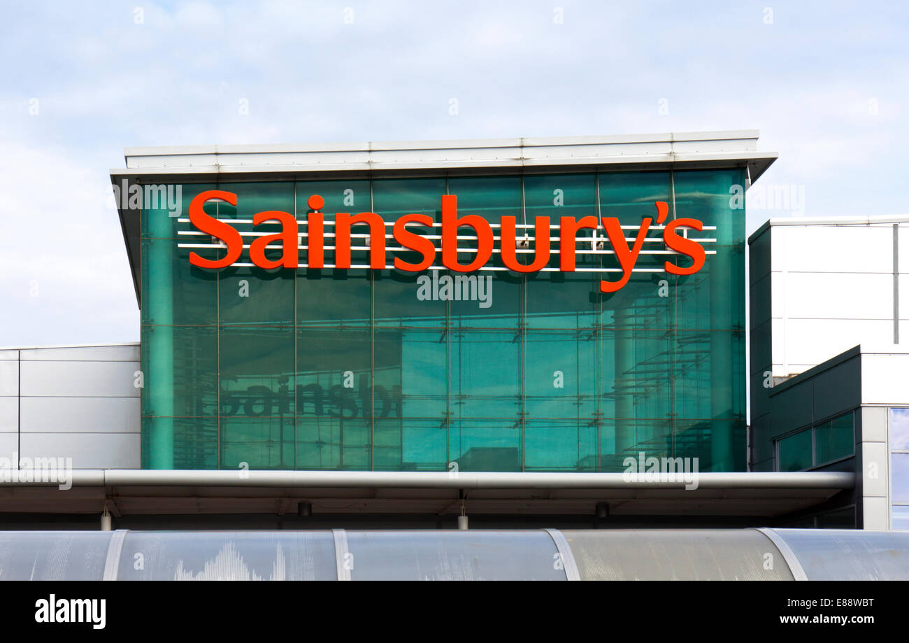 A supermarket store sign for Sainsbury's in a Norfolk Retail Park. Stock Photo
