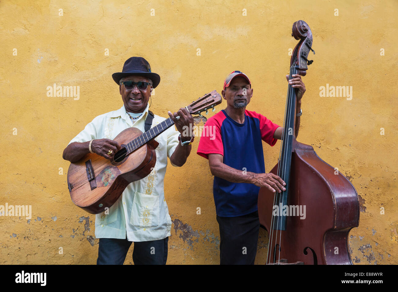 Musicians in Historical Centre, Santiago de Cuba, Santiago de Cuba Province, Cuba, West Indies, Caribbean, Central America Stock Photo