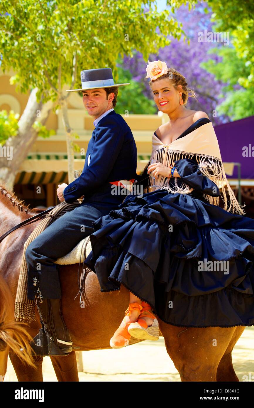 Spanish horse riders in traditional dress at annual Horse Fair, Jerez