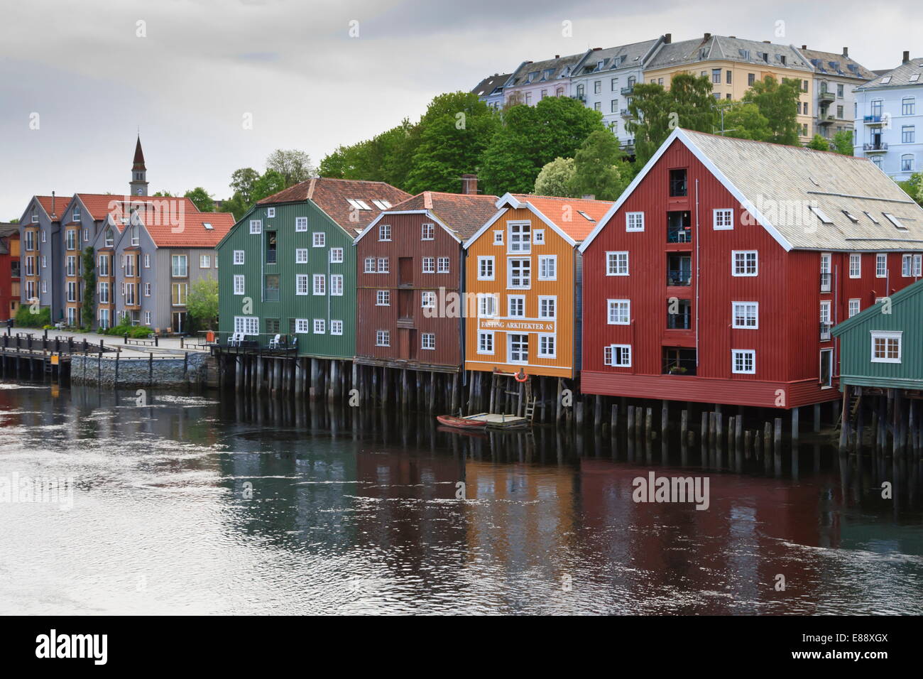 Warehouses on wharf beside the Nidelva River, Bakklandet neighbourhood, Trondheim, Sor-Trondelag, Norway, Scandinavia Stock Photo