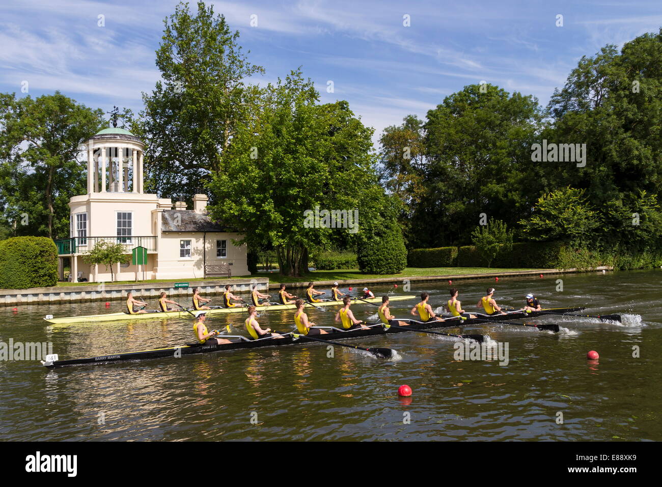 Two Rowing Eights pass Temple Island, Henley Royal Regatta, Oxfordshire, England, United Kingdom, Europe Stock Photo