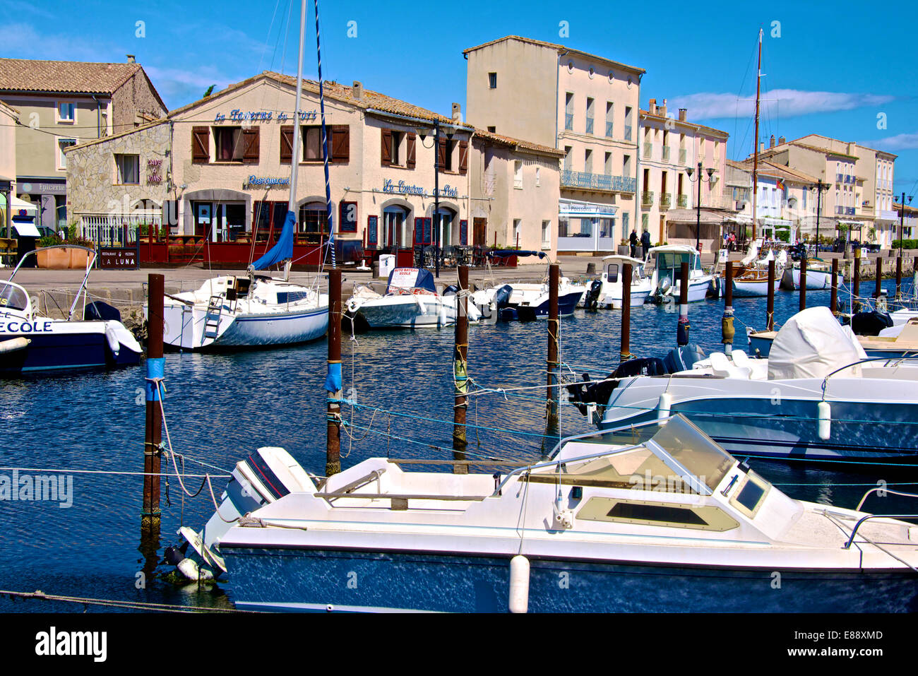 Tourist boats in marina in Marseillan harbor, Herault, Languedoc-Roussillon region, France, Europe Stock Photo