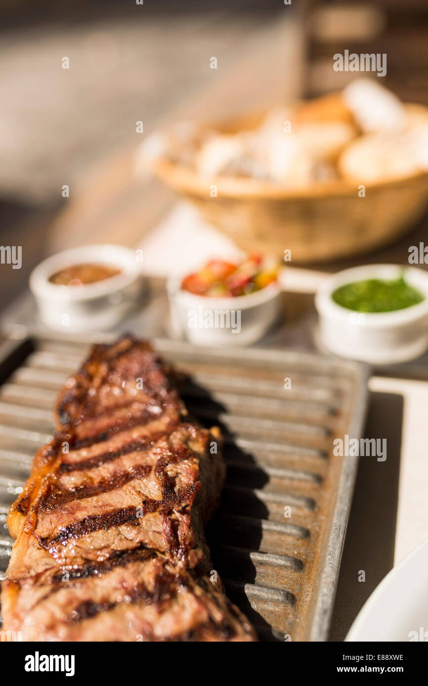 Steak meal at a traditional Parrillia, San Telmo, Buenos Aires, Argentina, South America Stock Photo