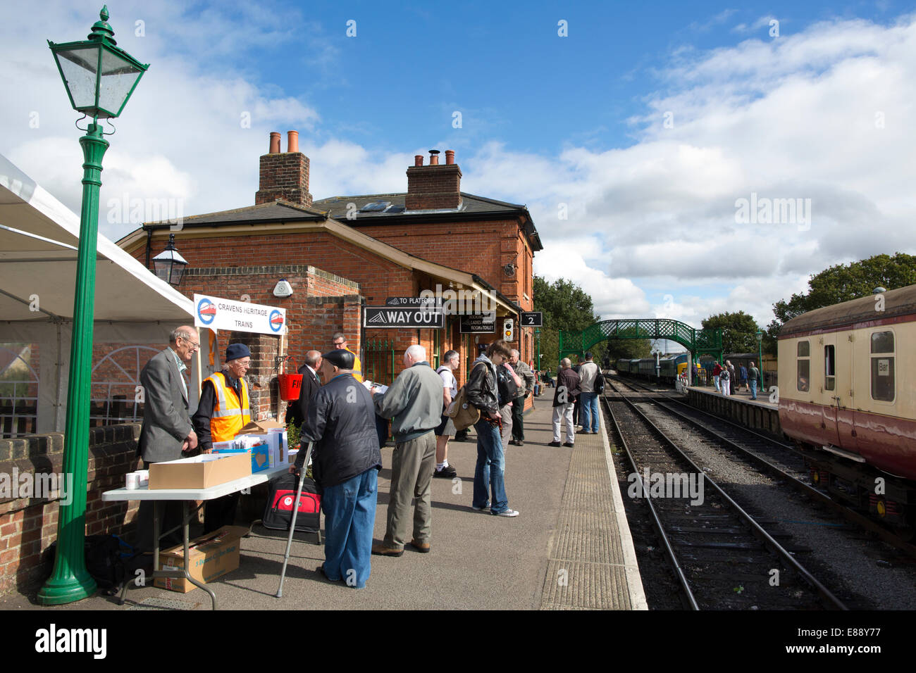 Cravens Heritage Tube train enthusiasts on the platform at North Weald Station, Epping Ongar Railway, Essex, England, UK Stock Photo