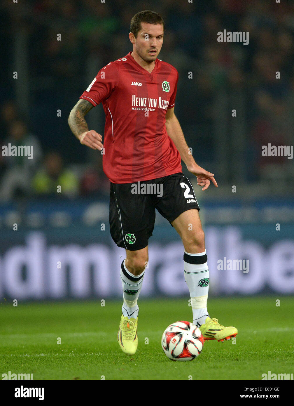 Hannover's Leon Andreasen controls the ball at the Bundesliga game between Hannover 96 and FC Koln in the HDI Arena in Hanover, Germany, 24 September, 2014. Photo: Peter Steffen/dpa Stock Photo