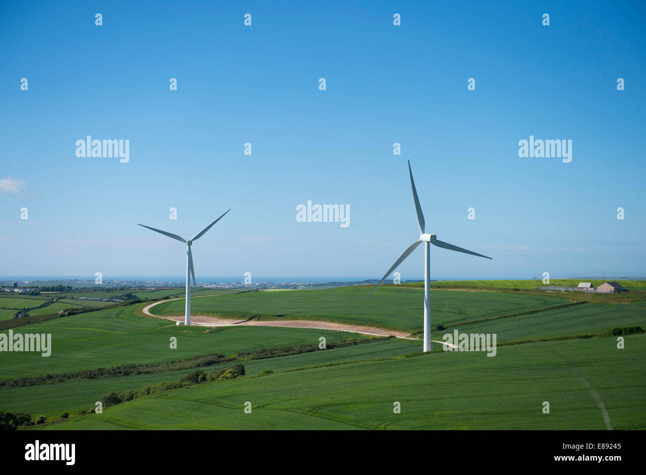Wind turbines producing renewable energy in Cornwall. Stock Photo