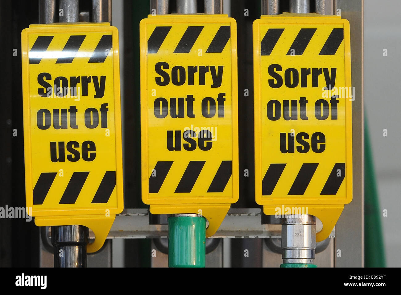 Fuel pumps with a sign that reads 'sorry out of use' after petrol/diesel shortages. Stock Photo