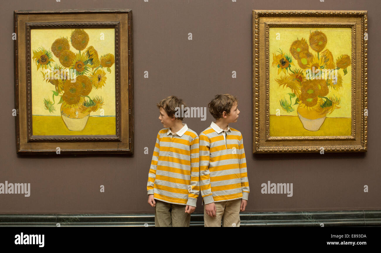 Van Gogh's Sunflowers from 1888 Number 88 and 89 go on display at the National Gallery-Gabriel and Edgar-10 year old twins Stock Photo