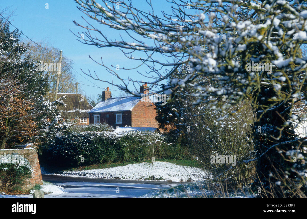 View of cottages in village in the snow Stock Photo - Alamy