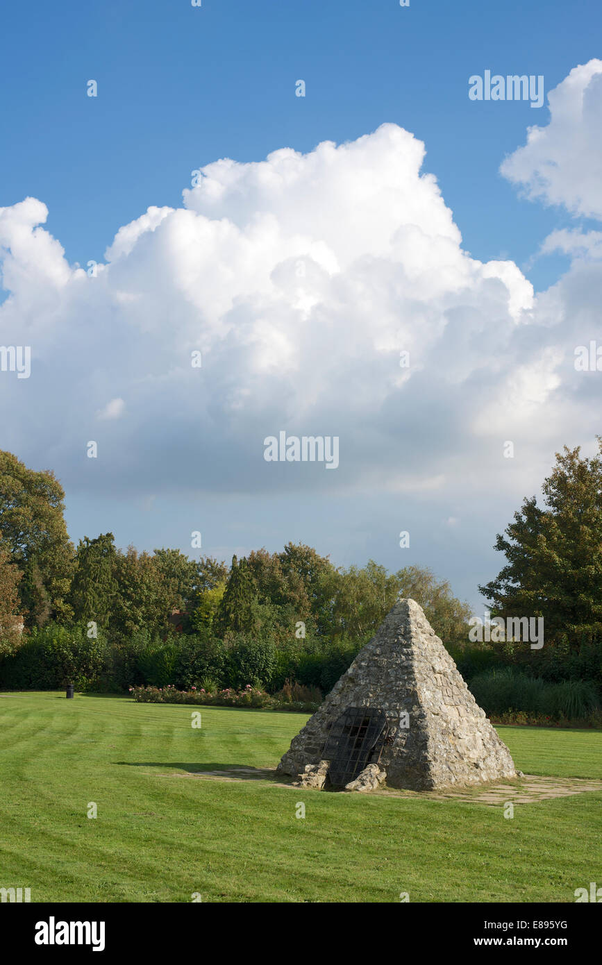 Towering Cumulus Clouds over Reigate Castle Grounds and the entrance to the Baron's Caves, Reigate, Surrey Stock Photo