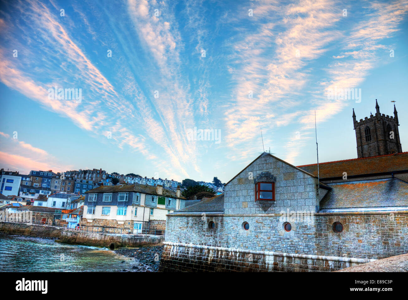 St Ives town homes houses church harbour sea at dusk Cornwall coast