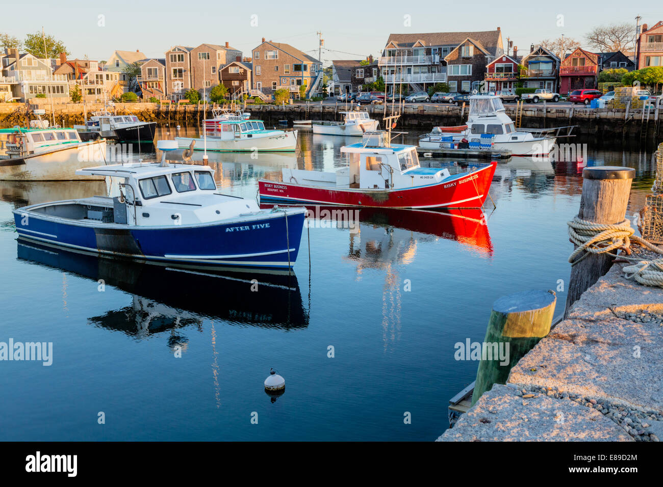 Risky Business and After Five fishing boats docked at Bradley Wharf in Rockland, Massachusetts at sunrise. Stock Photo