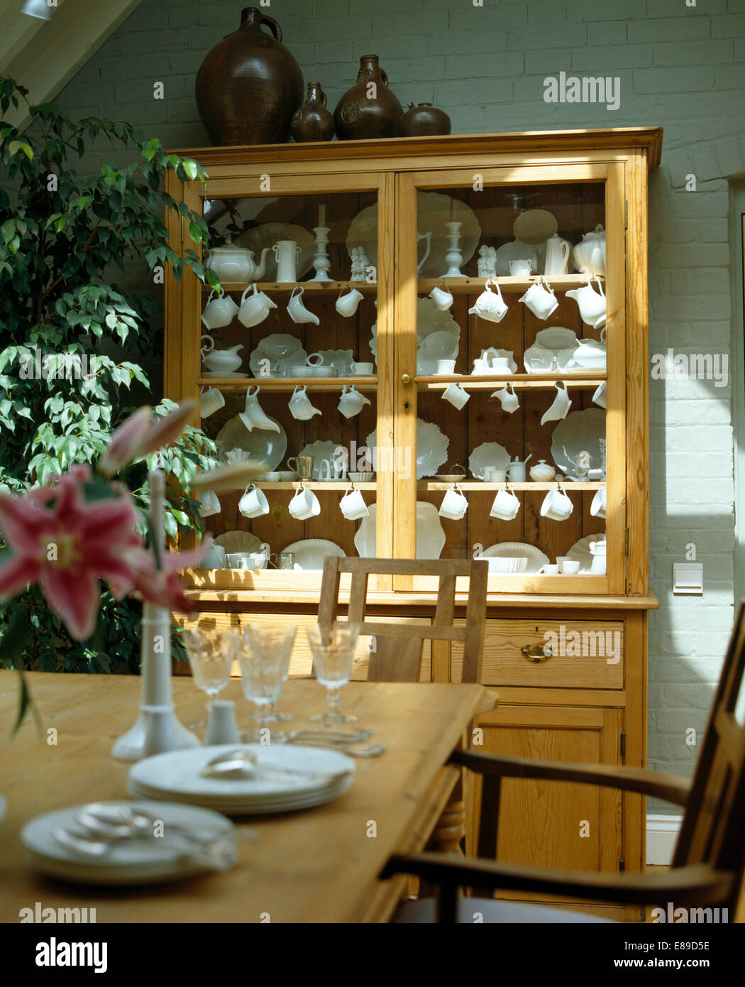 Old Pine Dresser With Collection Of White China Behind Glass Doors