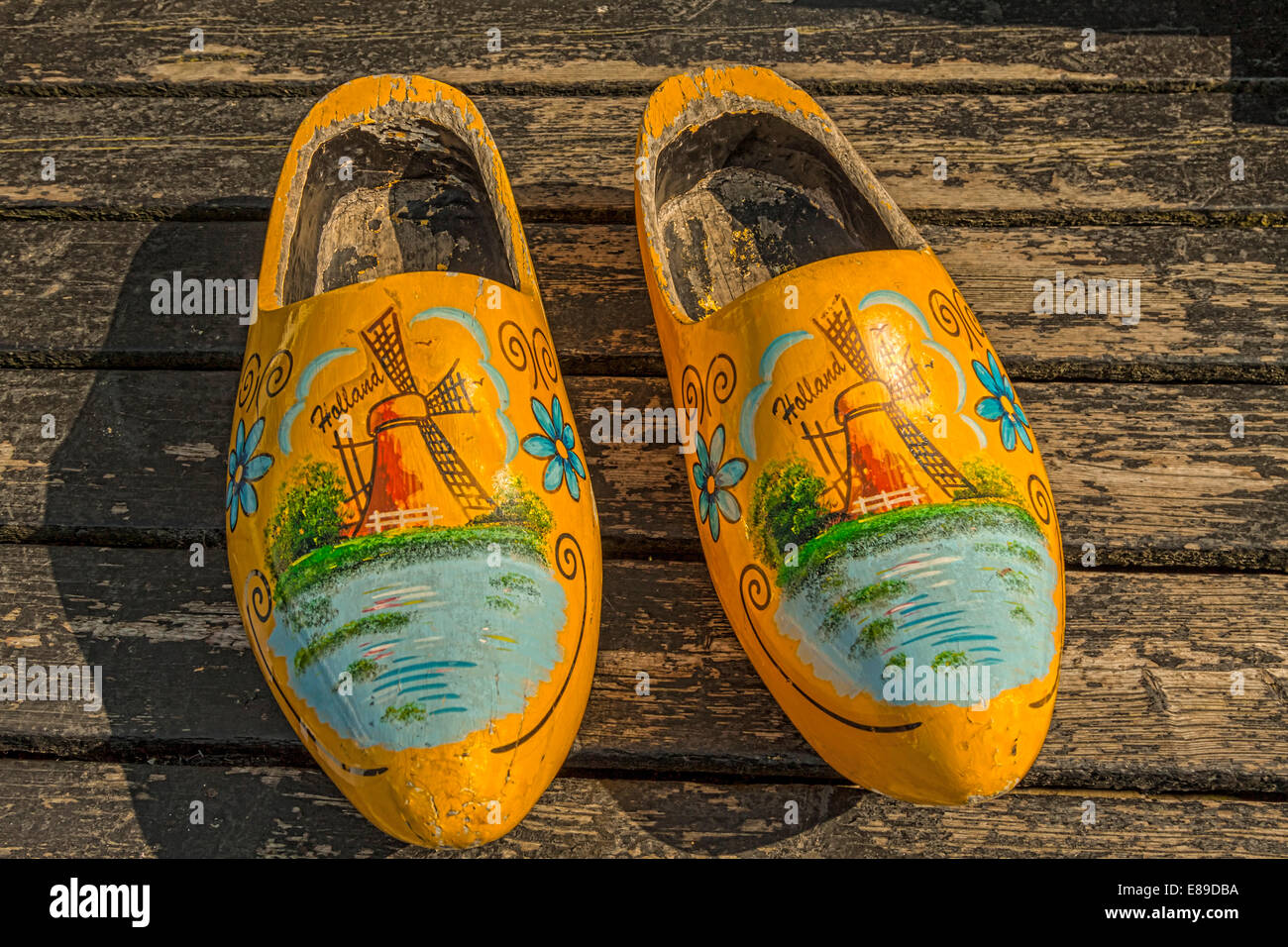 Dutch clogs or wooden shoes, decorated with a windmill and flowery design,  Marken, Waterland, North Holland, The Netherlands Stock Photo - Alamy